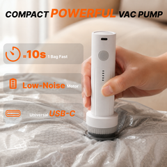 Rechargeable USB-C vacuum pump attached to an OBBSEA storage bag